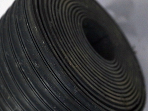 3103 21 FOOT ROLL OF RIBBED GRAY FLOORING 34 INCH WIDE